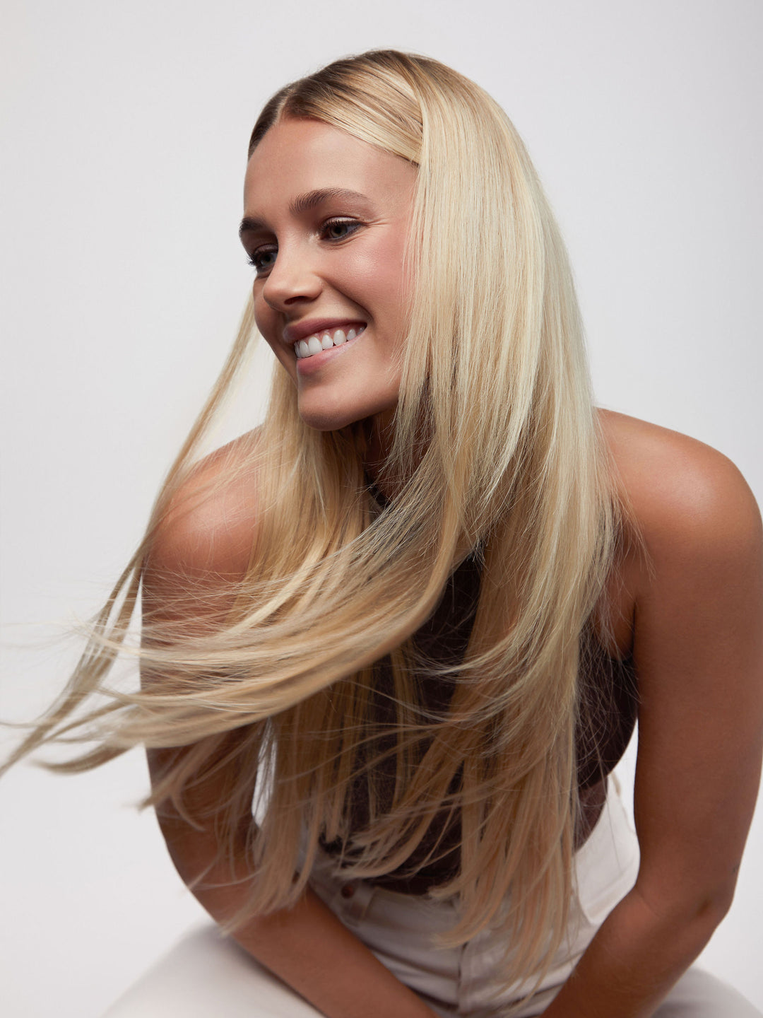Caramel Blonde Seamless Clip-In Hair Extensions (20" and 180 Grams)