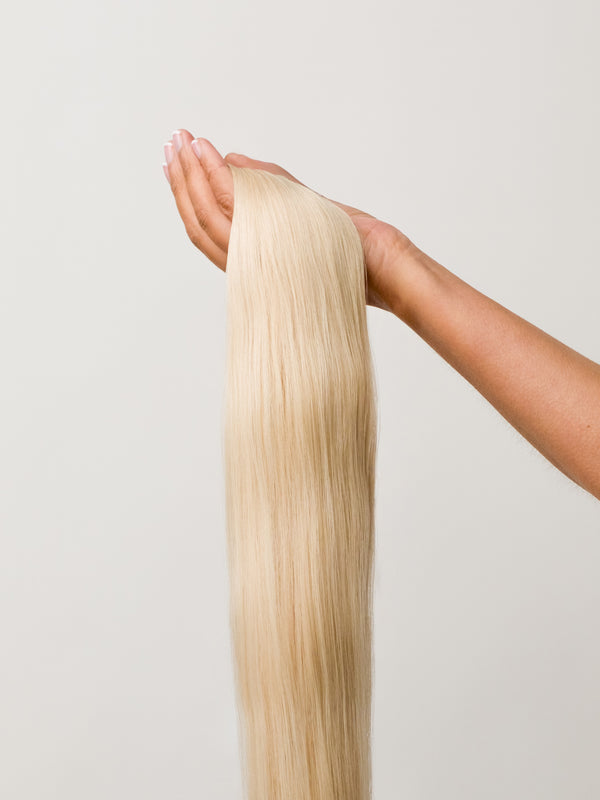 Goldilocks Blonde Seamless Remy Clip-In Hair Extensions (20" and 180 Grams) Goldilocks Blonde Seamless Remy Clip-In Hair Extensions (20" and 180 Grams)