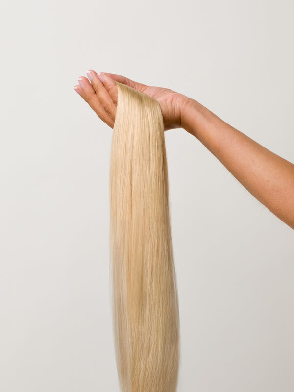 Hollywood Blonde Seamless Clip-In Hair Extensions (20" and 180 Grams) Hollywood Blonde Seamless Clip-In Hair Extensions (20" and 180 Grams)