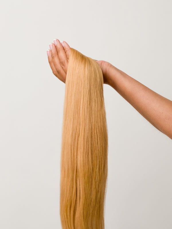 Strawberry Blonde Seamless Clip-In Remy Hair Extensions (20" and 180 Grams)