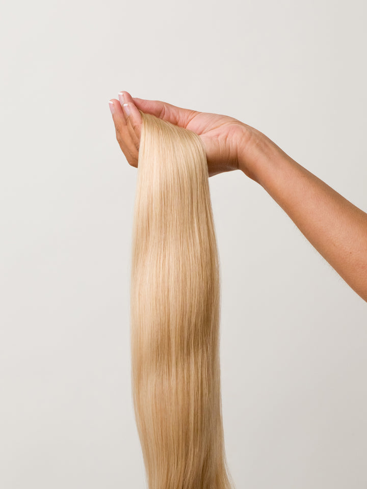 Caramel Blonde Seamless Clip-In Hair Extensions (20" and 180 Grams)