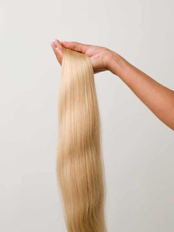 Caramel Blonde Seamless Clip-In Hair Extensions (20" and 180 Grams)